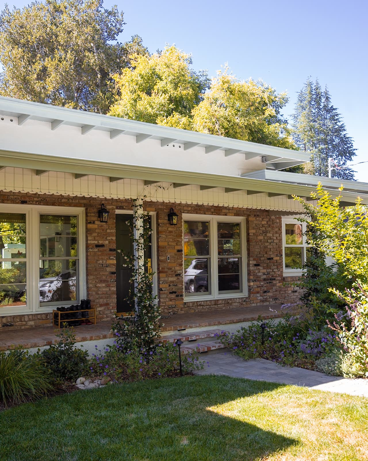 Front elevation of a Menlo Park whole-house remodel with brick and board-and-batten siding